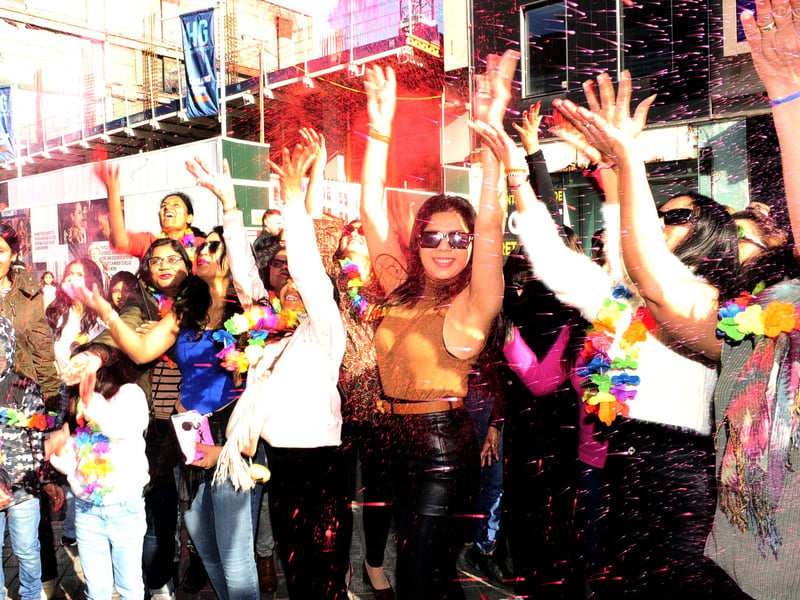 Dancers gathered on Briggate for a surprise flash mob organised by renowned Bollywood instructor Chiragi, centre.
