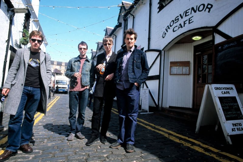 Travis, group portrait on Ashton Lane in 1997. Andy Dunlop, Fran Healy, Dougie Payne, Neil Primrose. 