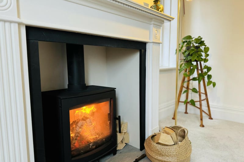 Here is also a log burner with a feature surround.