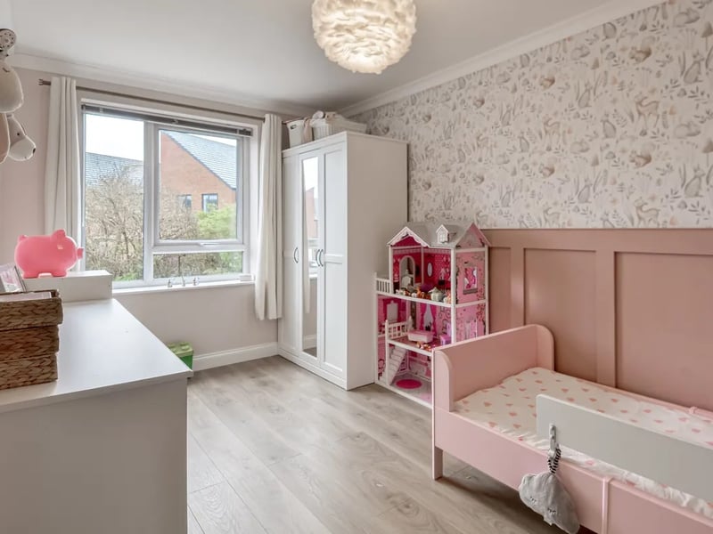 There are three bedrooms in total. Bedroom two and three are smaller and excellent as childrens' rooms.