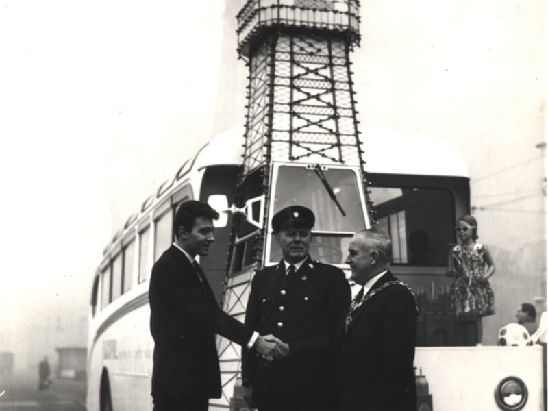 The Blackpool publicity coach ready to leave Blackpool on January 21, 1965. Barry Morris shakes the hand of Mayor Albert Ashworth, watched by driver Ronnie Bennett