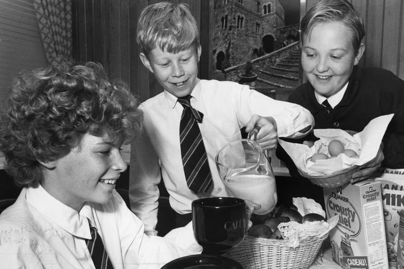 Cafe au lait for Nicola Christie as she enjoys a continental breakfast in the Mortimer Comprehensive School restaurant, with Graham Hall and Ian Maskell. This one takes us back to September 1990.