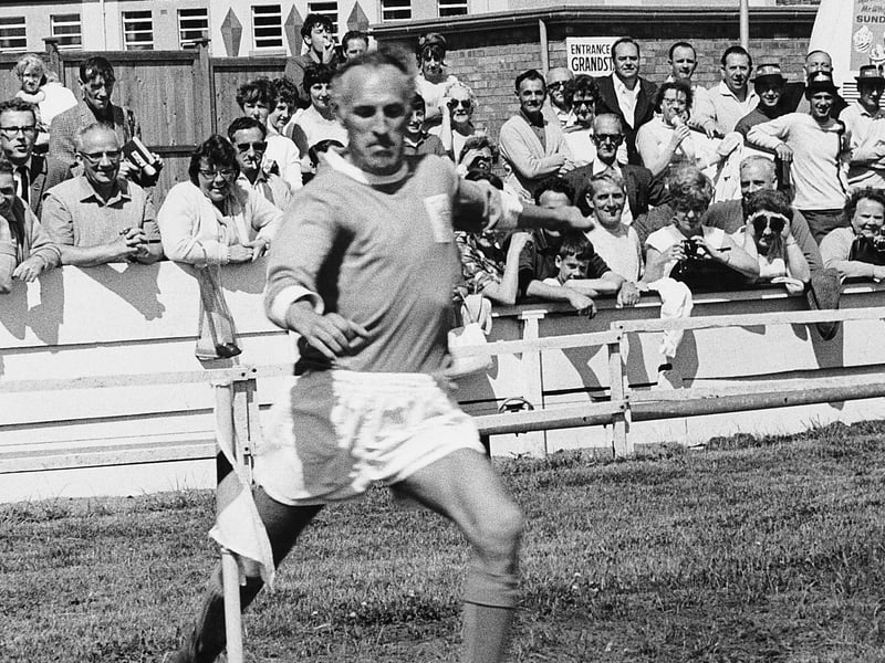 Bruce Forsyth playing football for the showbiz 11 in a Blackpool kit in 1965