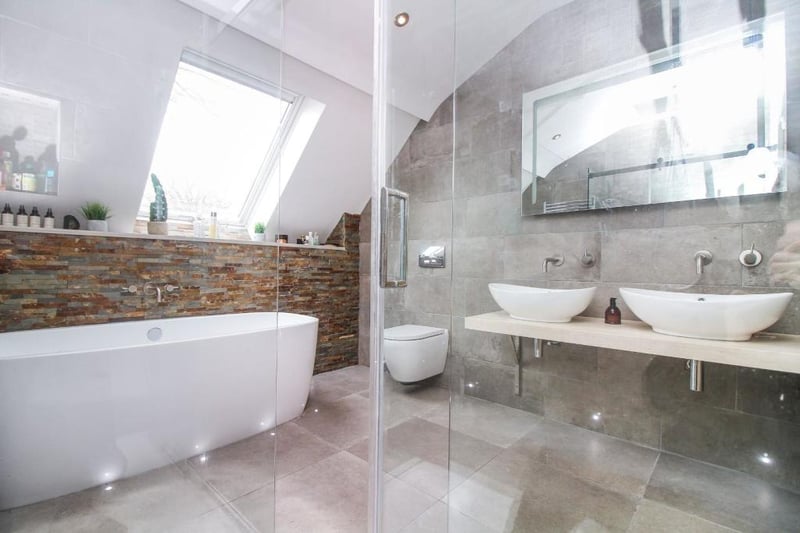 The unique home has three bathrooms spread throughout the property.