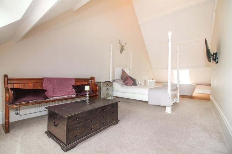 The property makes the perfect family home with five bedrooms spread across the upper floor of the former church.