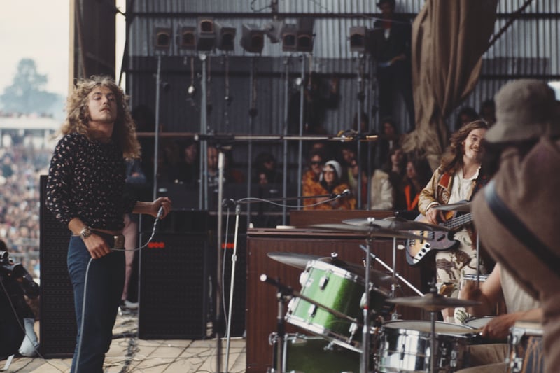 British rock group Led Zeppelin performing at the Bath Festival, Shepton Mallet, 28th June 1970. Robert Plant, from West Bromwich, pictured at the front of the stage