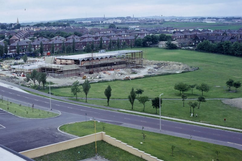 The building of the first stage of the Scatcherd Sports Centre at the western edge of Scatcherd Park. The photo was taken with a telephoto lens from the tower of Morley Town Hall. The main part of this first stage was to build a new swimming bath to replace the building at the junction of Corporation Street and Fountain Street.