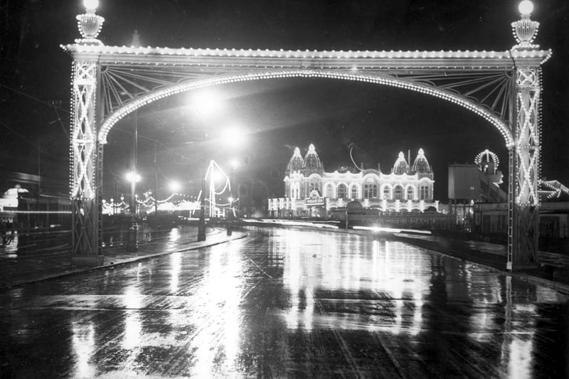 Through the glittering arch can be seen the original Casino building in 1925 - on which Coasters is modelled - at Blackpool Pleasure Beach
