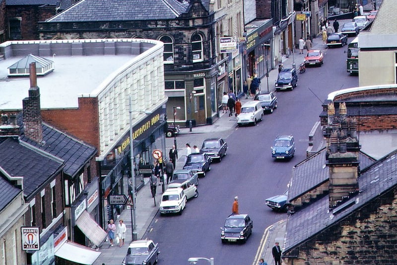 A telephoto shot of Queen Street between the Queen's Hotel and the Post Office near the Fountain. The centre of the photograph is by the top of Peel Street. Pictured in June 1973. 