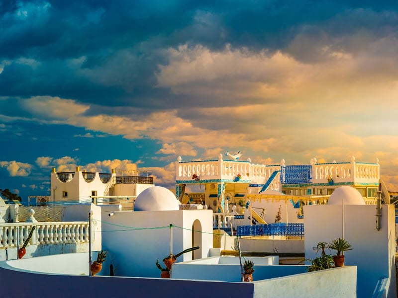Easyjet offer flights from Glasgow to Enfidha Airport in Tunisia. It serves the coastal resort town of Hammamet that enjoys temperatures of around 17°C in February. A light jacket is recommended for going out in the evening. The flight takes around four hours.