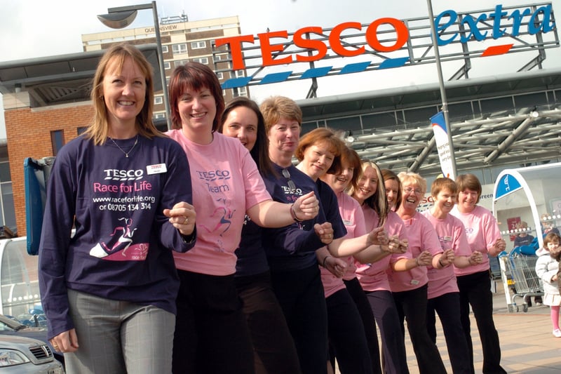 Some of the members of staff at the Tesco Extra store in April 2005  who were preparing to take part in the Race for Life. 