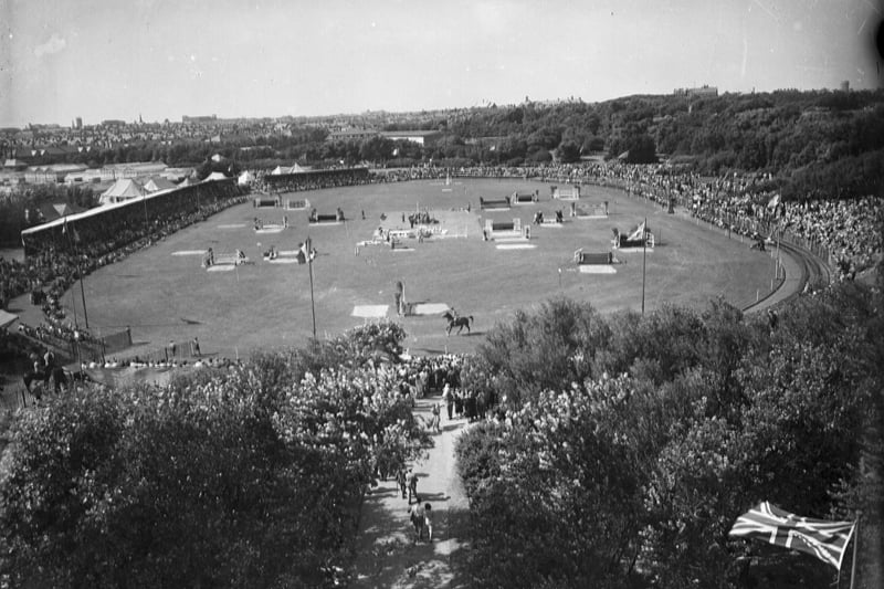 Royal Lancashire Show at Stanley Park, Blackpool, in 1949. The athletics ground  was used for the show jumping shown here in progress
