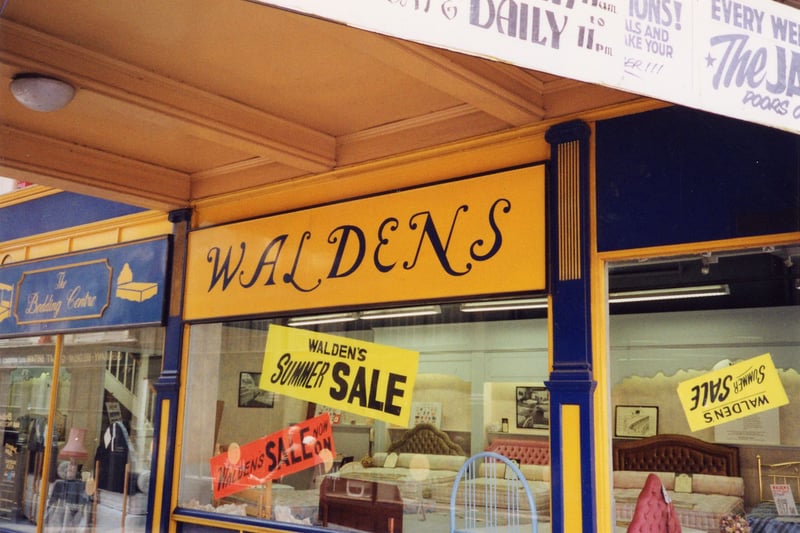 In side the Grand Arcade, showing Waldens, bed specialist, at No. 13-15. The shop is advertising a sale. Pictured in October 1990.