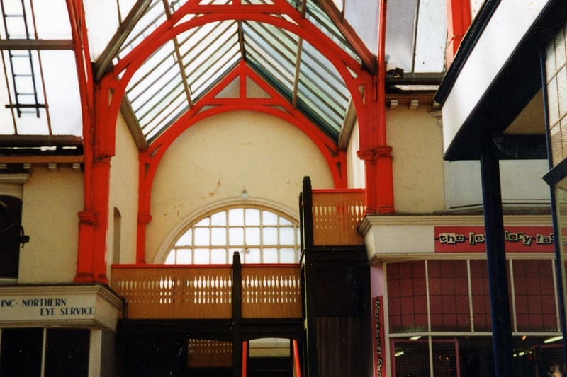 Inside the Grand Arcade, showing No.6 - 7, Brosgill and Leach, opticians, on the left, and No.8 The Jewellery Factory on the right, with a staircase in between. Pictured in October 1990.