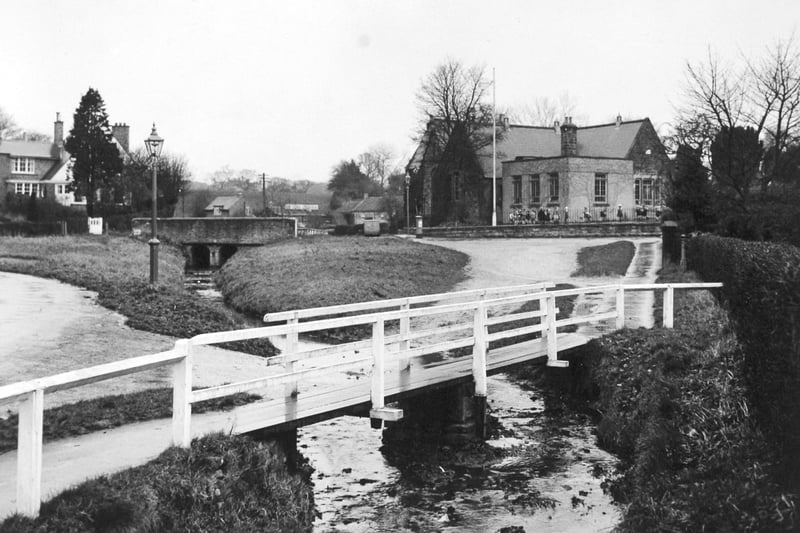 Scalby village with the school across the green. Pictured in Janaury 1950.