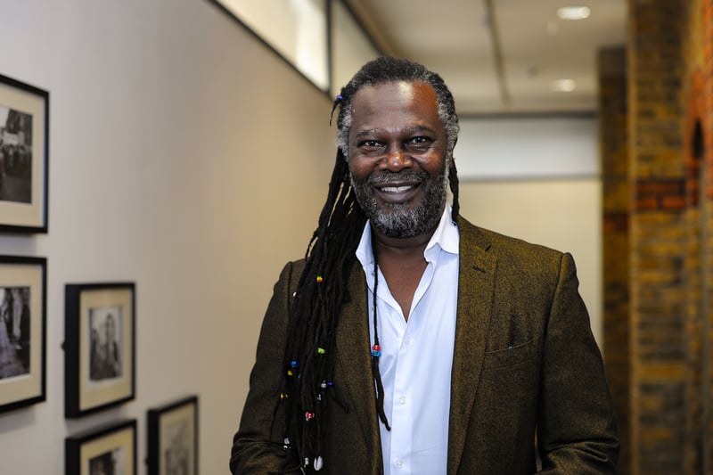 Levi Roots is a successful businessman and musician, best known for his appearance on the British television series "Dragon's Den," where he famously pitched his Reggae Reggae Sauce. 