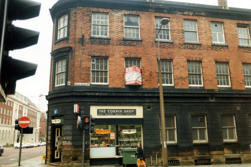 The Corner Shop, a newsagents at No.37 Cookridge Street at the junction with Great George Street. Above offices are advertised for rent. In 1992 the businesses in this building were closed down and the whole site redeveloped opening in 1996 as the Courtyard Bar. Pictured in April 1990.