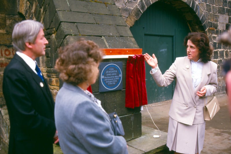 The unveiling of a plaque in August 1990 commemorating Colonel John Thomas North (1842-1896) in recognition of his gift of Kirkstall Abbey to the City of Leeds. It reads 'Colonel J.T. North 1842-1896 purchased the Abbey and grounds in 1888 and gave them to the city.'