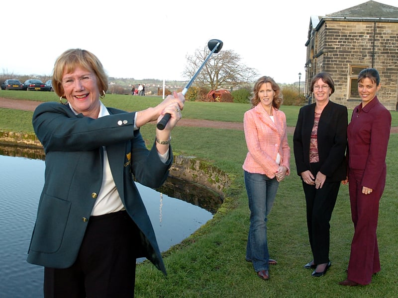 Golfers at Cookridge Hall Golf Club had raised more than£6,000 for two charities-Candlelighters and Ataxia Uk. Pictured in Decembr 2004 is lady's captain Carol Rushfirth teeing off, watched by the recipients who received the cheques at the golf club's AGM.They are, from left Joanne Llewellyn from Candlelighters, Jan Owen from Ataxia UK and Samantha Ball from Candlelighters.
