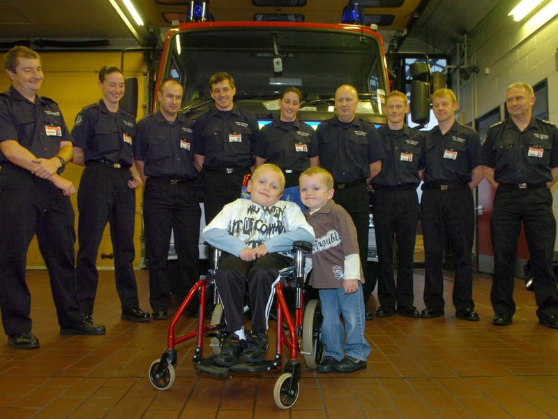 October 2005 and staff at
Cookridge Fire Station were raising money for spinal disorder sufferers Jack Bird, left and brother, Louis.