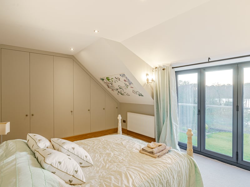Each of the rooms benefit from striking waterside views of the outside space. Gail adds: “We have a beautiful decking and windows that open right out to make the home an inside-out house.
“We also have the boathouse,
because we have a rowing boat that we enjoy taking out on the water.
“Our daughters would come and spend summers here, and I have two grandchildren, so that has been really nice.”