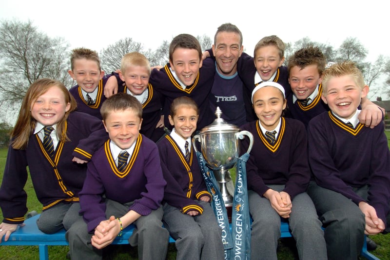 Leeds Tykes star John Bentley was at Holy Trinity School in April 2005  to show off the Powergen Cup to the pupils. He is pictured with members of the team who played for the school at Twickenham.