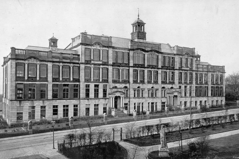A view of the old main building of West Leeds High School on Whingate circa 1940s. The two main entrances, one each for boys and girls, can be seen, and part of Charlie Cake Park is visible in the foreground. West Leeds High School opened on 7th September 1907, with the building design based on the façade of a school in Switzerland. It was located on Whingate, Armley, just south of Town Street. It housed two schools in one building, for boys and girls, each housed in a separate wing. By the 1950s the two schools were known as West Leeds High School for Boys, and West Leeds High School for Girls, and in 1959 the girl’s school moved to a new campus south of the railway line, on Campus Mount, while the boy’s school remained at the campus on Whingate.