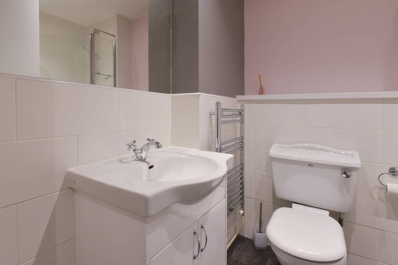The accommodation is completed by a master bathroom which is also partially tiled. The bathroom has a white three-piece suite with a mains shower over the bath. There is also excellent storage in the reception hall.