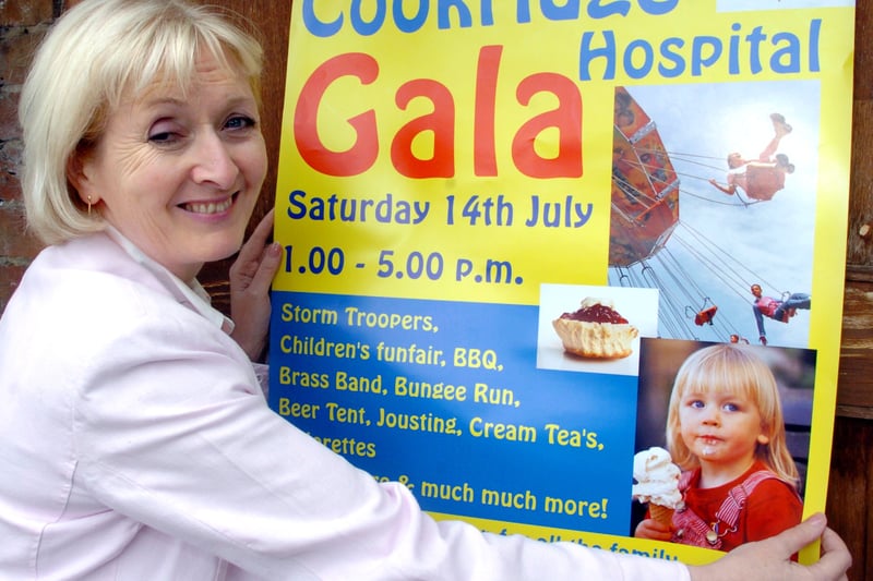 Julky 2007 and Sheila O'Shea puts up a poster to promote Cookridge Hospital Gala.