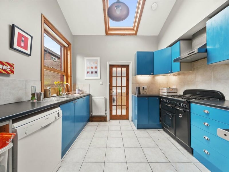 A huge skylight in the kitchen allows light to gently flow into the room.