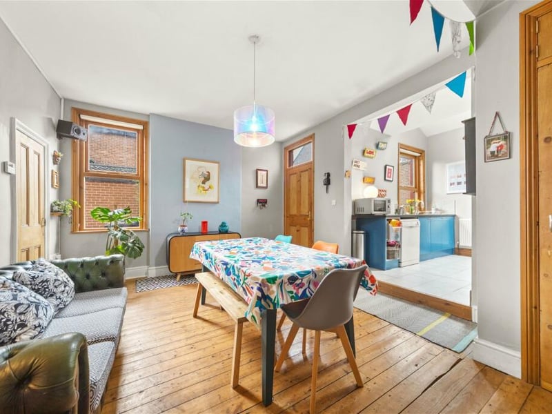 Walk into this large dining room wooden flooring which opens up to the kitchen.