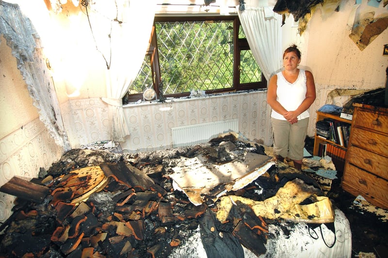 Cookridge resident Cherry Dabill is pictured in the bedroom of her house in July 2006 after it was struck by lightning.