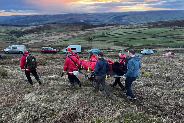 Edale Mountain Rescue team take the casualty to the ambulance. Picture: Edale Mountain Rescue