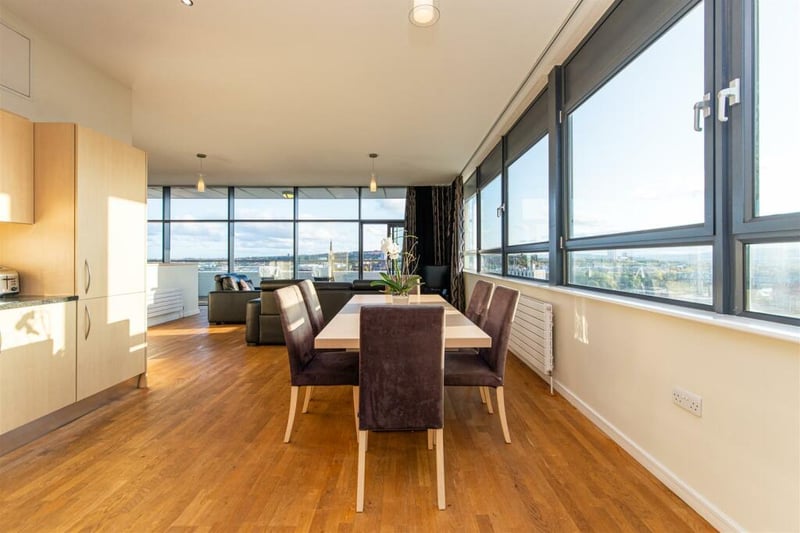 The dining area within the apartment is a great space for hosting family and friends.