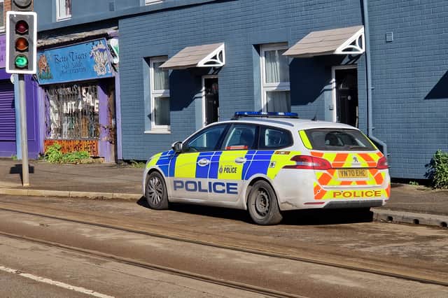 A police car parked outside the flats on Infirmary Road today. Photo: National World