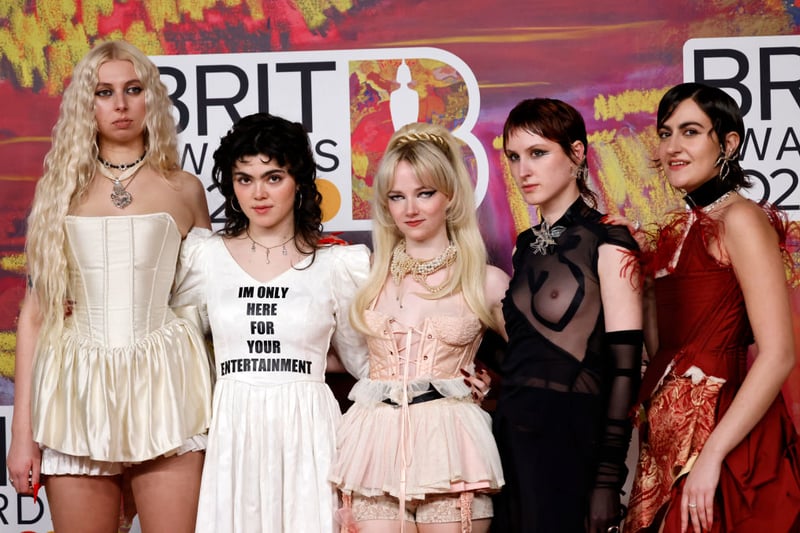 Abigail Morris, Lizzie Mayland, Emily Roberts, Georgia Davies and
Aurora Nishevci from The Last Dinner Party make a statement at the Brit Awards.