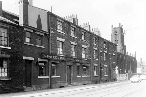 The Falcon Inn on Great Wilson Street pictured in July 1959. To the right is the junction with Church Cross Street, then Christ Church which fronts onto Meadow Lane, at the right edge.
