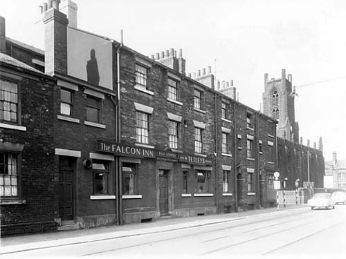 The Falcon Inn on Great Wilson Street pictured in July 1959. To the right is the junction with Church Cross Street, then Christ Church which fronts onto Meadow Lane, at the right edge.
