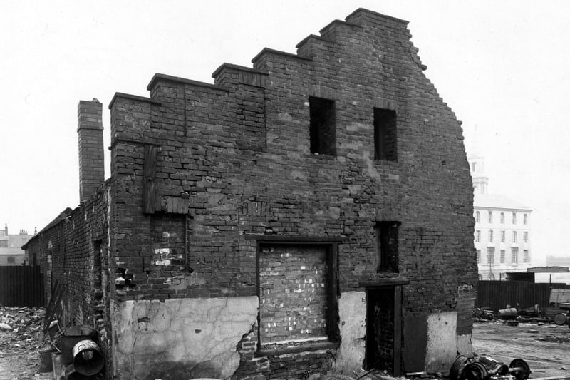 Derelict property off St James' Street.The Civic Hall can just be seen in the background. Pictured in September 1949.