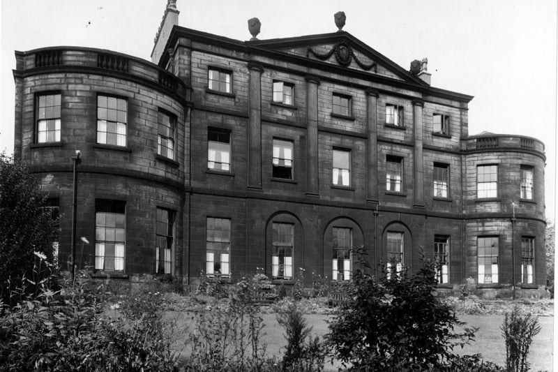 The facade of Denison Hall (nursing home,) looking north with gardens in front pictured in September 1949. Denison Hall was built in 1786 by William Lindley for John (Wilkinson) Denison. In 1796 it was leased by Sir Richard van Bempe Johnstone. Later, in 1806, Harry Wormald became the owner. George Rawson next developed the estate in 1824. The Hall was divided into two residences but remained in single ownership until it was sold in 1912 by Edmund Wilson who had lived in the western house. By 1917 it had become a nursing home and in 1962 an old peoples home. After 1989 it was empty for some years before being converted into apartments.