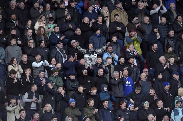 Owls fans who made the short journey to Rotherham to watch a 1-0 win in the local derby.