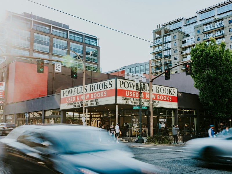 This iconic shop claims an entire block of the city with over a million new, used, and rare books stacked floor to ceiling across multi-level rooms. Grab an old-school paper map at the door and explore Powell’s nine color-coded rooms complete with 3,500+ sections. Iconic features include the Rare Book Room and the Espresso Book Machine for print-on-demand titles.