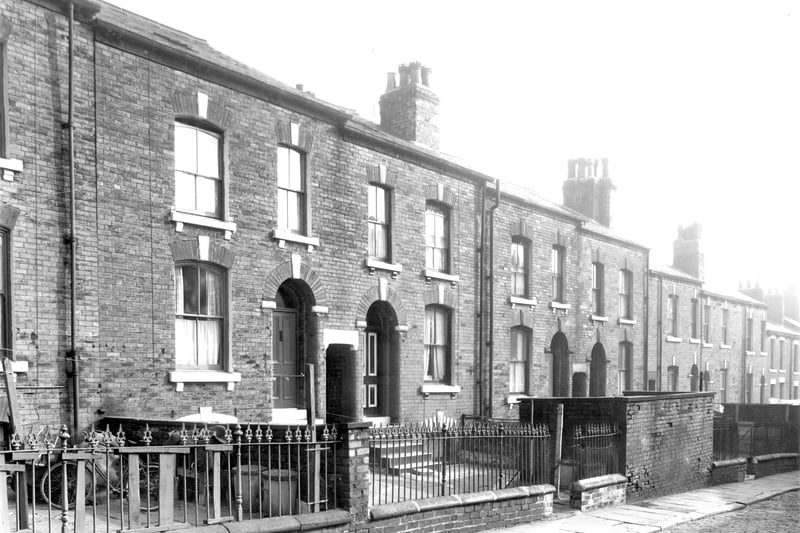 Back-to-back properties on the odd numbered side of Lower Brunswick Street. This street had no number 13 property. Instead, number 11a can be seen on the left with number 15 next door. The row continues to the right in ascending order. Pictured in September 1959.