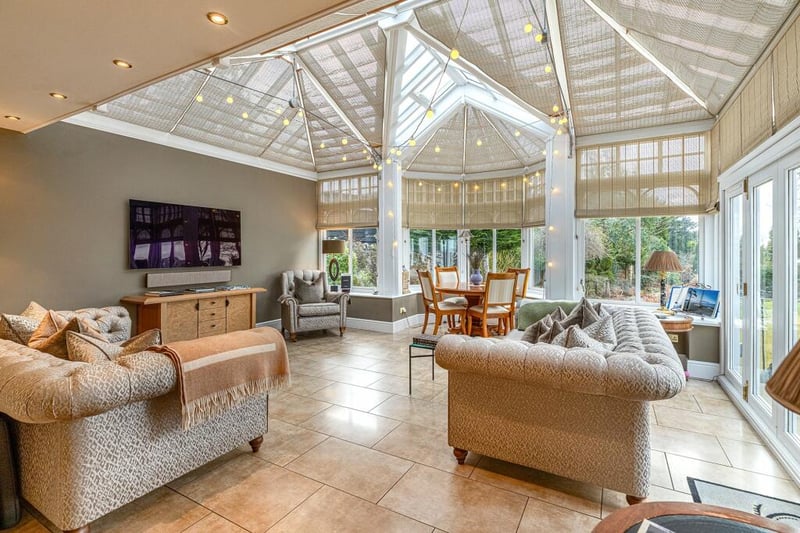 The wonderful conservatory/family room was produced by the high-end manufacturer Amdega. 