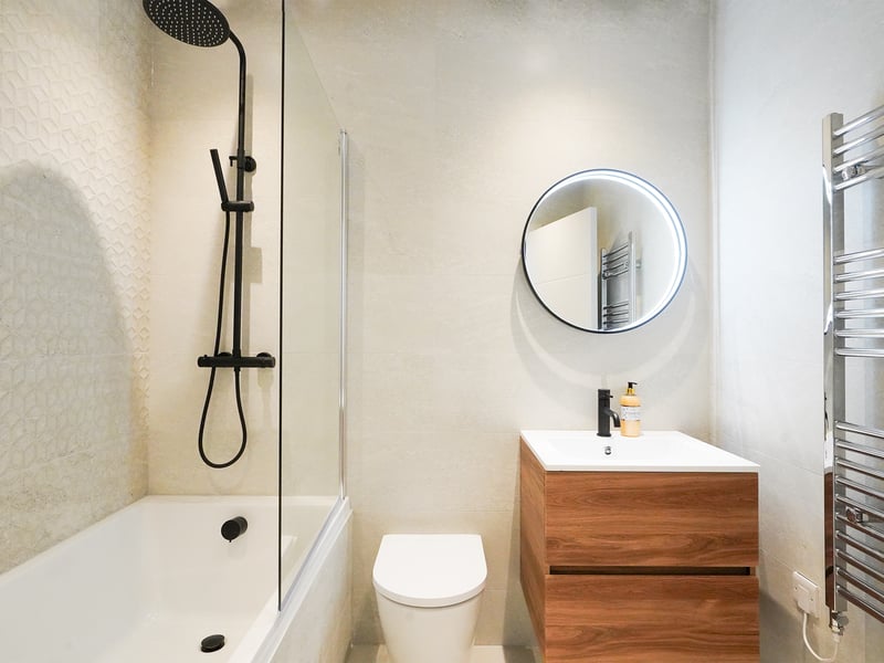 The main bathroom is found right in the centre of the apartment - easy to reach from anywhere.