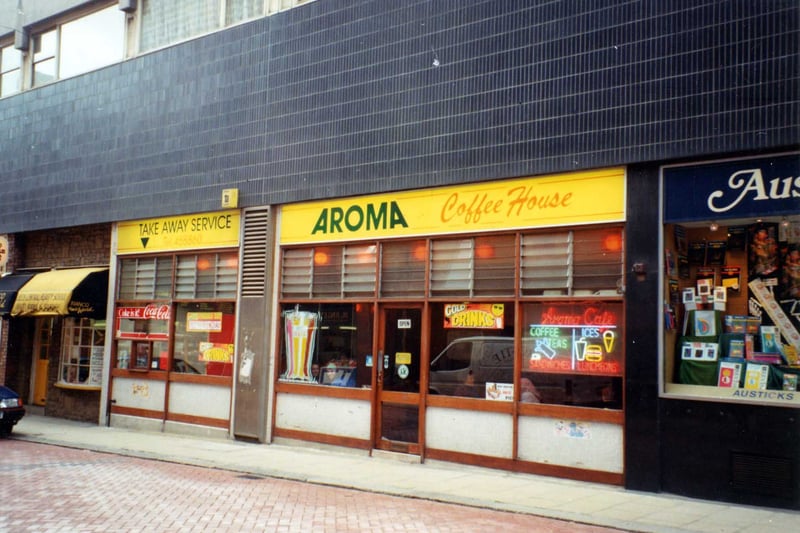 Aroma Coffee House on King Charles Street. To the left is Bianco Hair World and on the right Austicks' Bookshop. Pictured in August 1991.