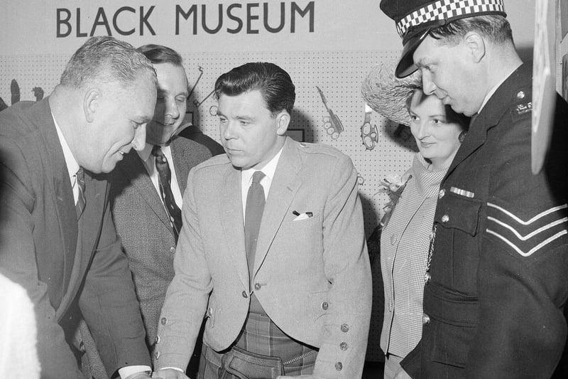 Scottish entertainer Andy Stewart opened the Ideal Home Exhibition in Waverley Market in 1965, then took a look at the exhibits at Black Museum of the Police stand.