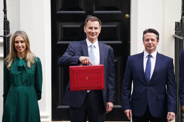 Jeremy Hunt outside Downing Street ahead of the Budget. Credit: PA