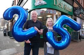 Vaughan Steel is celebrating  25 years since opening Deli-Shuss sandwich shop in Sheffield city centre. Pictured with employee Zoe Price.