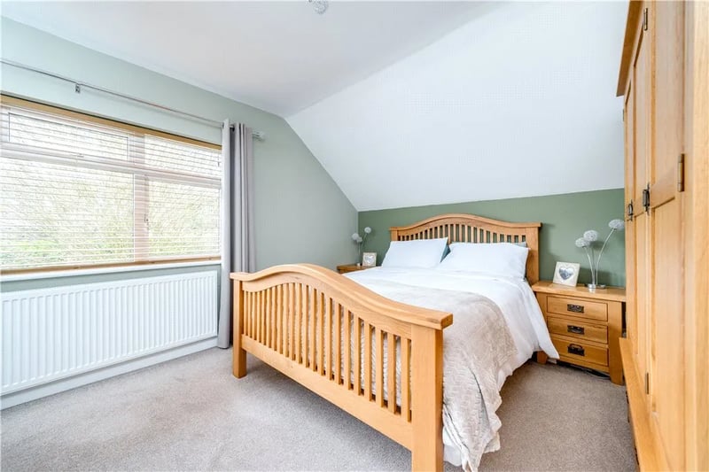 The main bedroom has built in fitted wardrobes that are perfect for storage.
